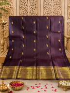 Kasturi: Coffee-Brown Kanjeevaram, Peacock-Coin Buttis