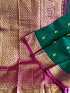 Panna: Emerald Green Kanjeevaram with Wide Magenta Border