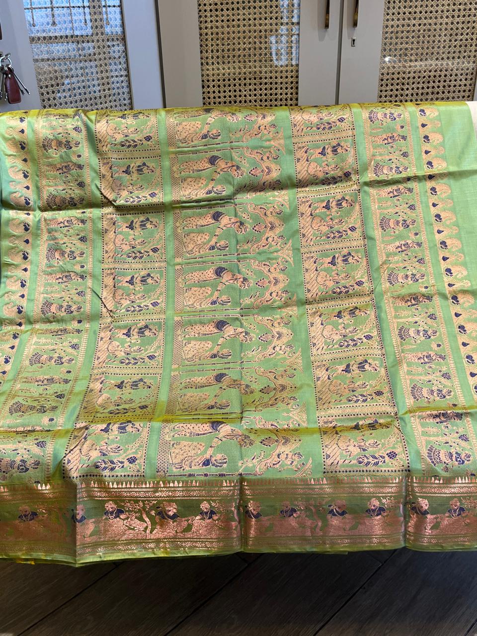 Vanashree: Sage Green Swarnachuri with Royal Procession