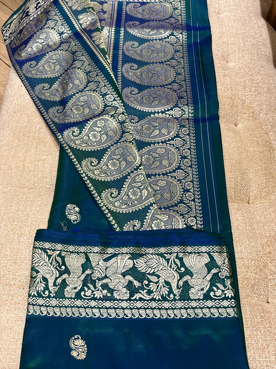 Aranya: Bottle Green Baluchari with Floral Butti