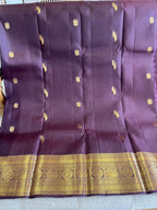 Kasturi: Coffee-Brown Kanjeevaram, Peacock-Coin Buttis