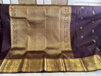 Kasturi: Coffee-Brown Kanjeevaram, Peacock-Coin Buttis