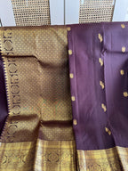 Kasturi: Coffee-Brown Kanjeevaram, Peacock-Coin Buttis